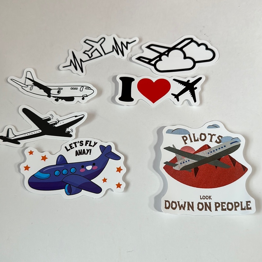 7 piece bundle  of airplane stickers